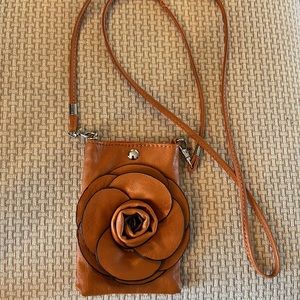 Small purse color-cinnamon with large flower  6 1/2 in long x 4 in wide